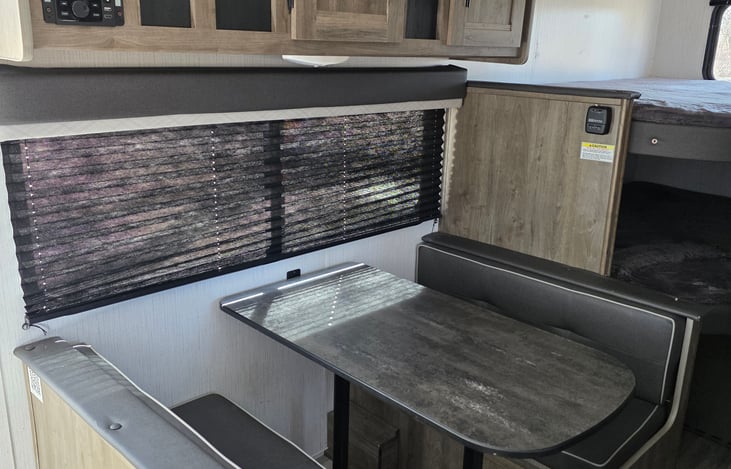 Dining Area & Storage Cabinets
Storage available under Bench Seating