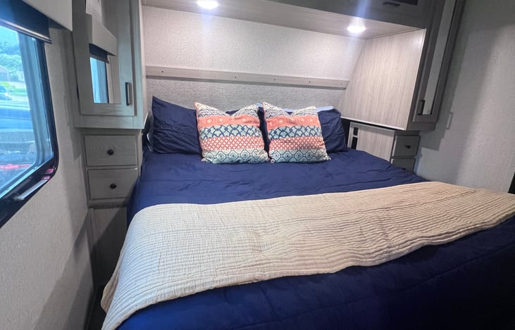 Master Bedroom with door & king bed