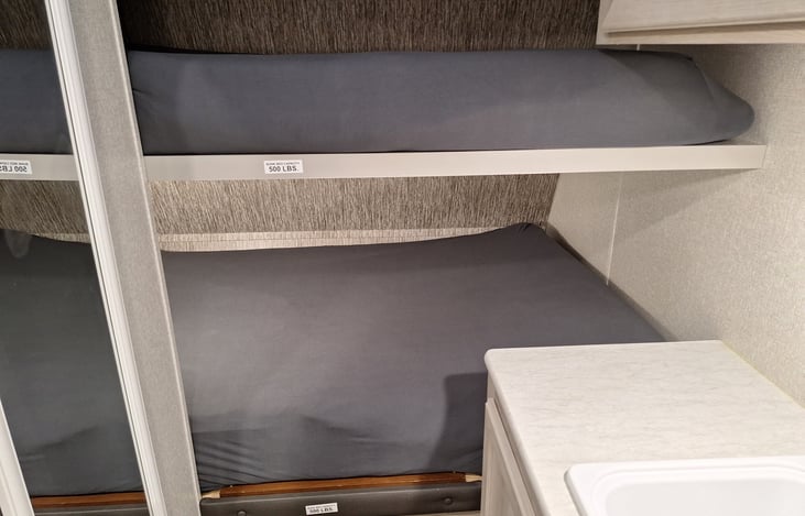 Bottom Bunk 50x87 memory foam w fitted sheet
Queen size beds are 60x80