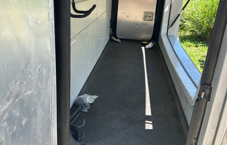 Large rear pass-through cargo area.