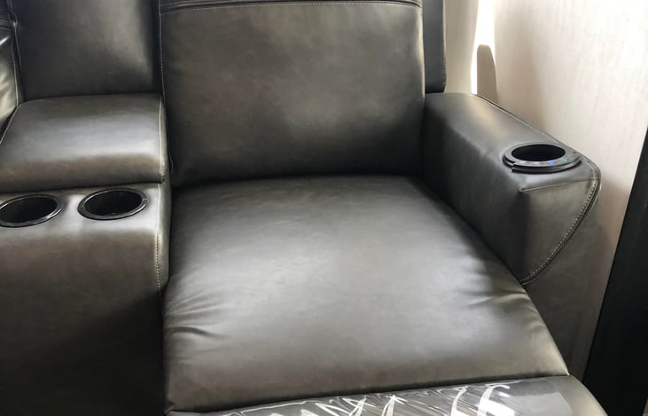 Theatre recliners with heat and massage settings
