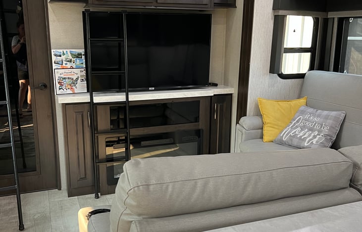 Reclining L- Shaped sofa with pull out bed.