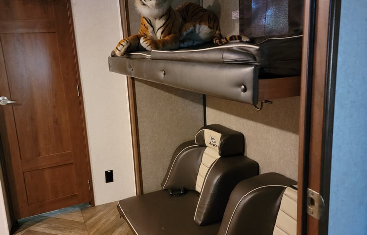 Chairs remove to make bottom bunk.