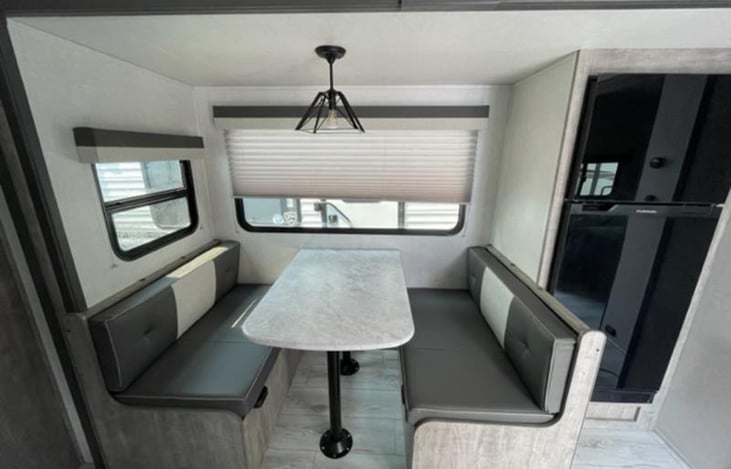 Dinnette converts to bed, storage under seats.

Large 10cu Ft 12v Fridge and freezer