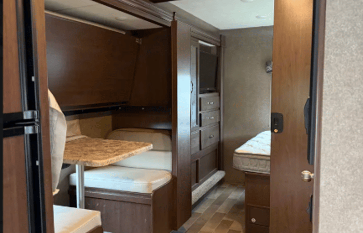Looking towards the master sleeping area with sliding door.