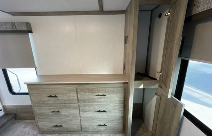 TV hookup above dresser if you wanted to provide your own tv for long stays.