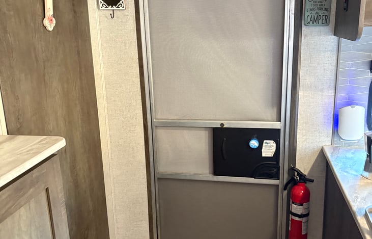 Entrance and exit with fire extinguisher