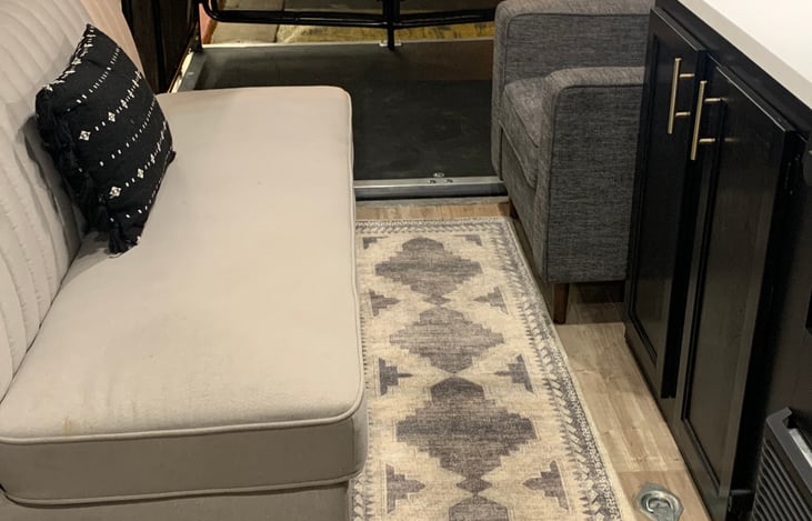 Home grade sofa and accent chair. Easily moves out to deck.