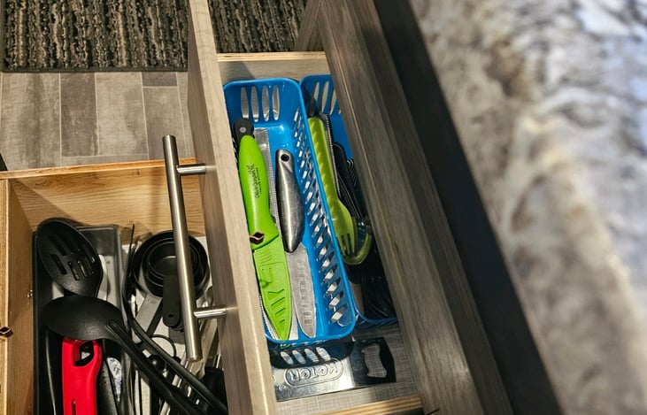 Drawer storage in kitchen for all the utensils and cutlery you need.
