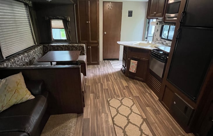 Kitchen, dinette, and couch