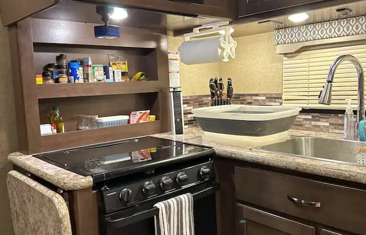 Fold out counter extension for extra food prep space.