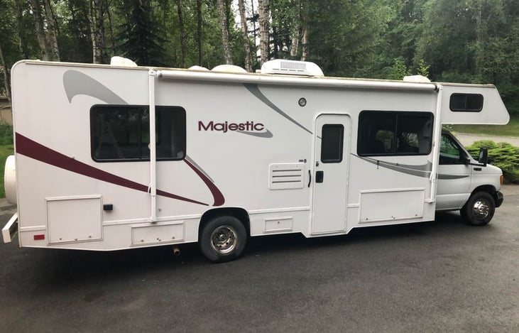 Entrance side where you open the awning and set up the rug and chairs.