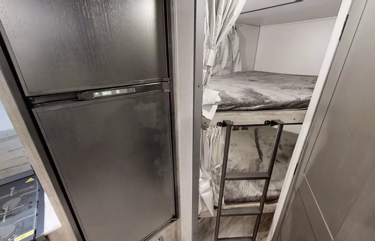 Double bunk beds. Each has their own window, light, and USB plug ins