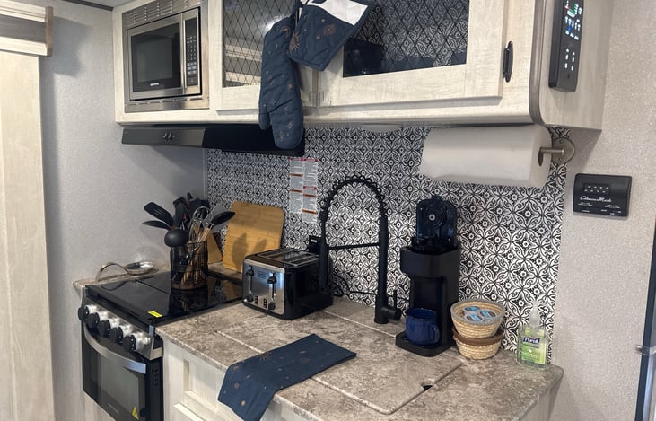 Double stainless steel sink converts to counter for added space!