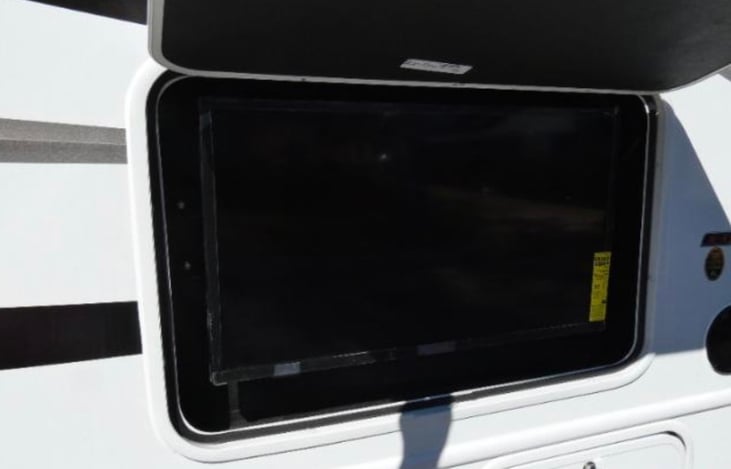 There is an outdoor RV to enjoy during tailgating or to have a movie night under the stars.  It is covered with an awning to shade yourself a bit.