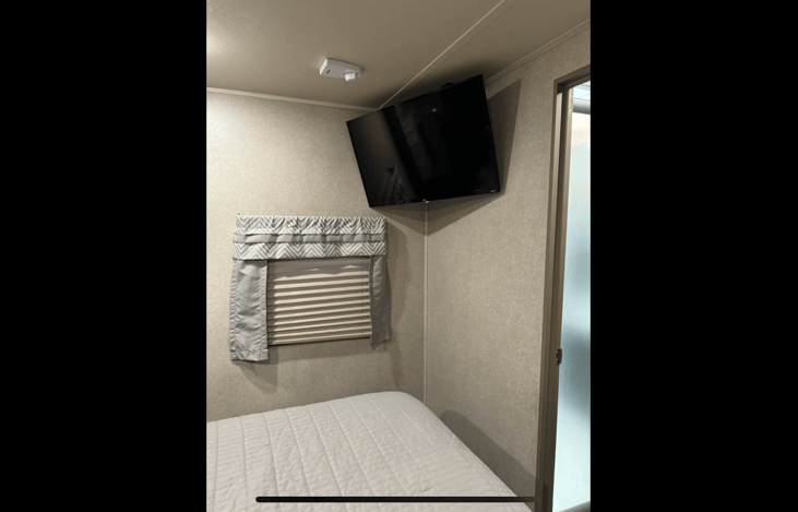 32” tv in master bedroom.