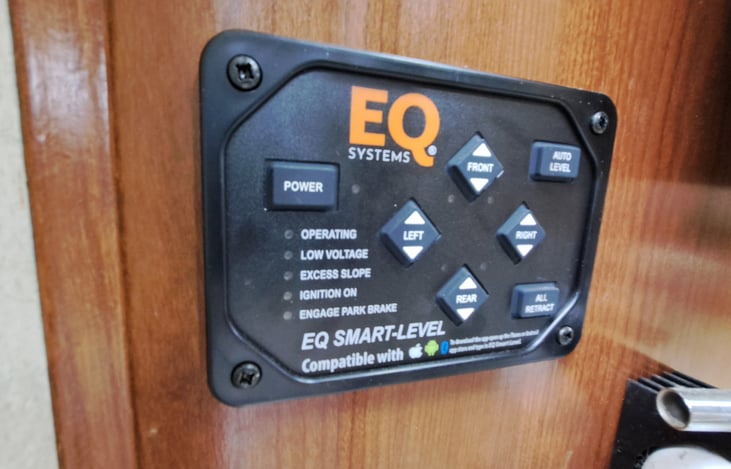 This RV is self leveling with jacks.  One button and it does the rest for you.