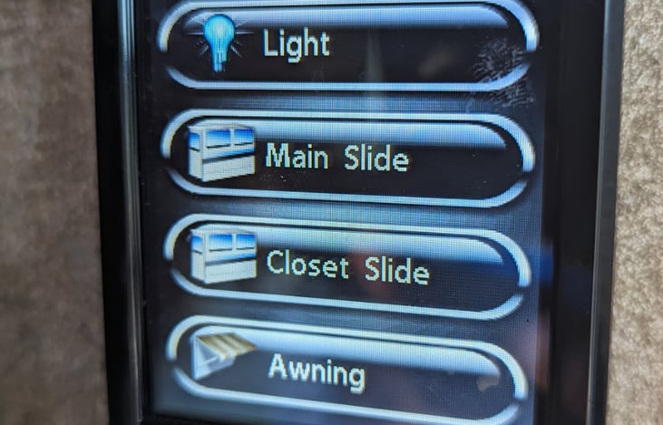 Operate the lights and awning with a wireless controller.