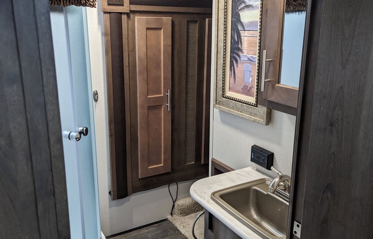 Linen closet and medicine cabinet for all of your storage needs.