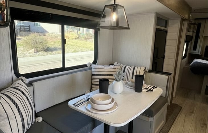 Comfortable dining space that easily converts into additional sleeping.