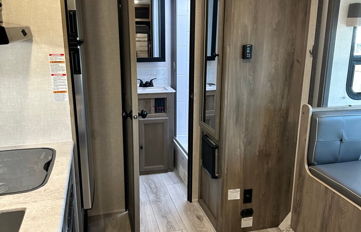 Bathroom and storage on the right