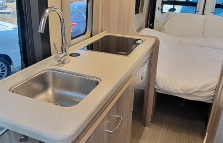 Kitchen and bed view