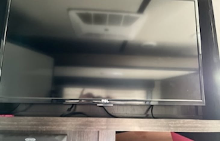 TV that pulls out to be adjusted.