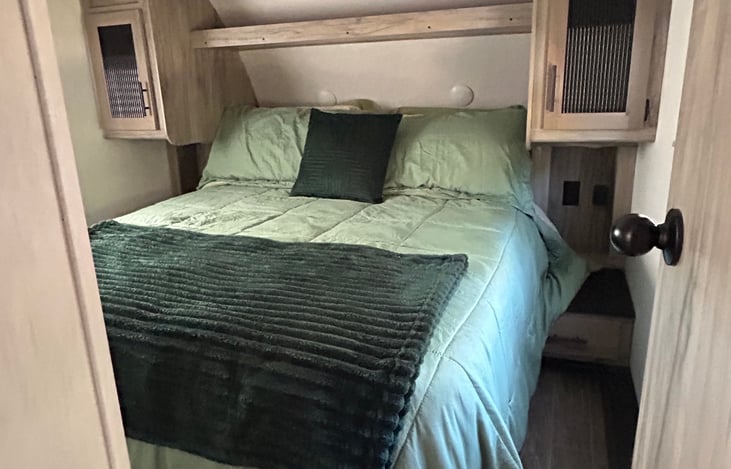 Comfy queen bed in master