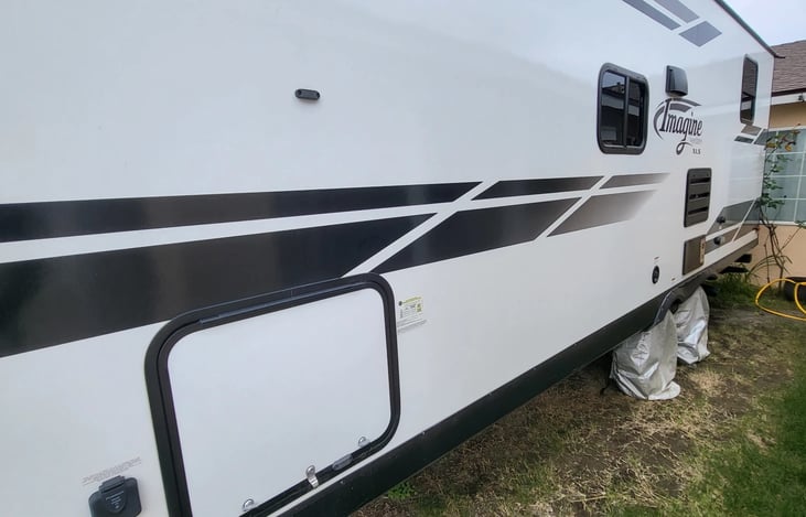 Storage area includes 4 outdoor chairs.
