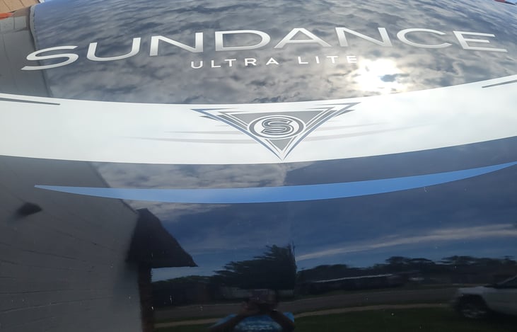 name of trailer on front