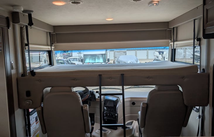 Another awesome feature! This is the front bunk that electrically raises and lowers. It's a double bed and pretty comfortable.