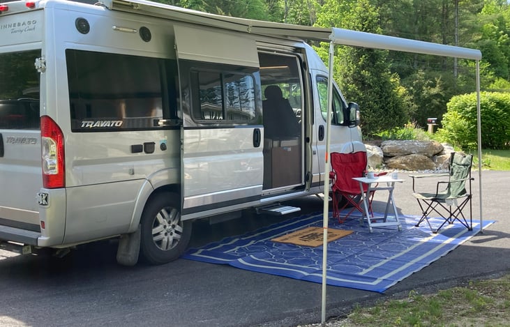 Awning - carpet, table & chairs optional