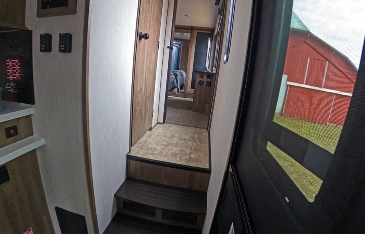 Main entryway, stairwell to master bedroom.