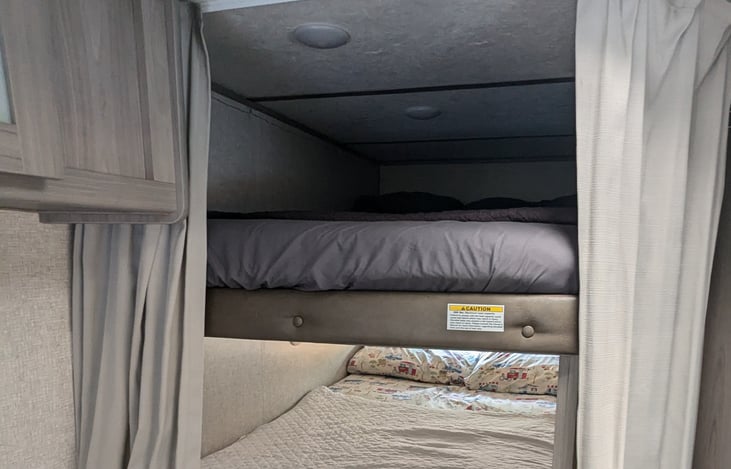 The bunkbeds. You can close the curtains completely for privacy or blocking out the lights.