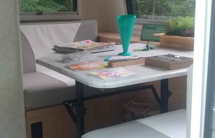 Dining area with table set up vs bed or sofa