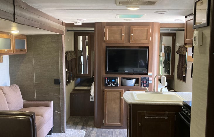 Main area, TV, radio, bluetooth connection to smart phones, speakers inside and outside