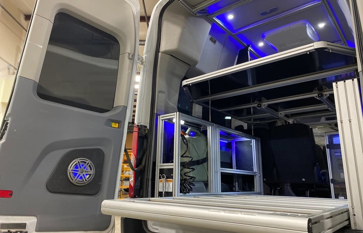 Gear slide and storage area. Water pump, 5 gallon tank, and hose on the left side