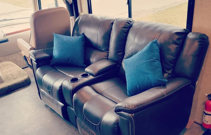 Chairs both recline and have seatbelts. can be moved when parked if wanting a different entertainment setup.