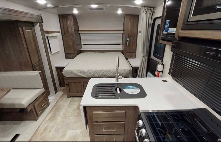 Flip-down murphy bed
when up - there are two reclining chairs