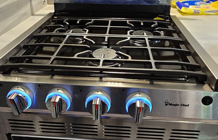 3 burner stove with convection/microwave oven