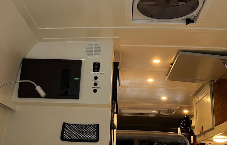 Fan shown above bed. Great for keeping the air moving.