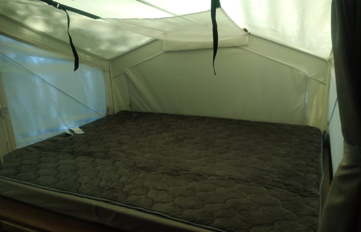 each queen size bunk with an overhead storage, light/fan combo available.