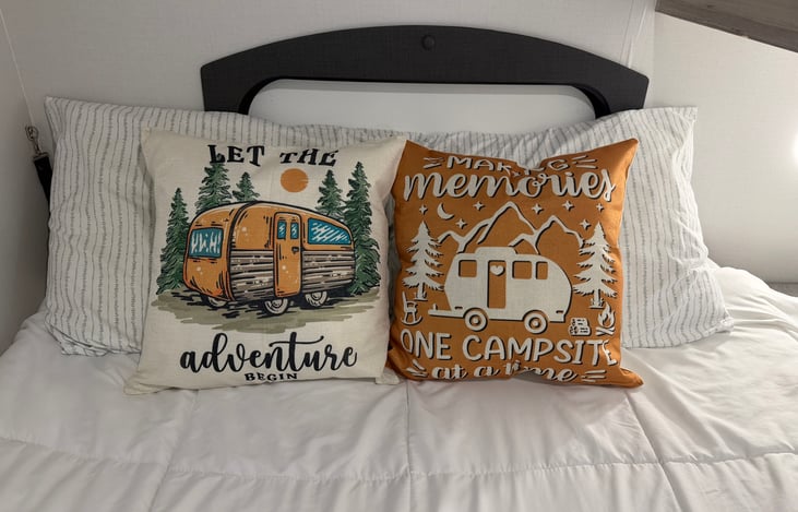 Clean comfy pillows and and bed spread included