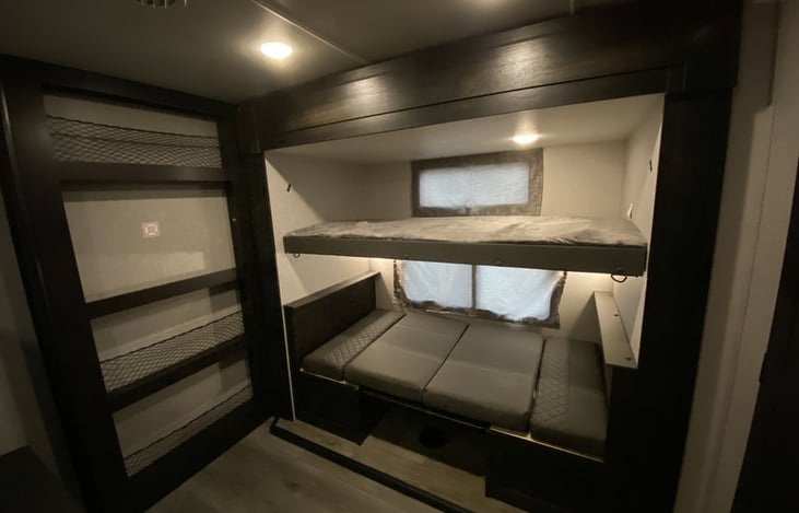 Spare bedroom, second top bunk and table folds down into another place to sleep.