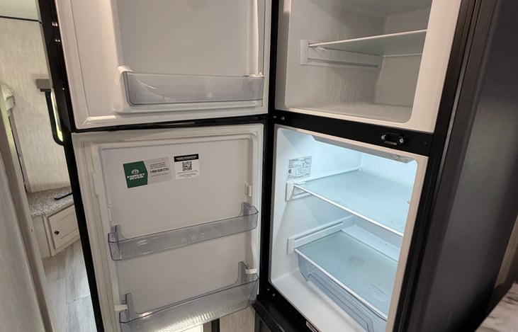 Large interior fridge, there is also another kitchen outside with another fridge.