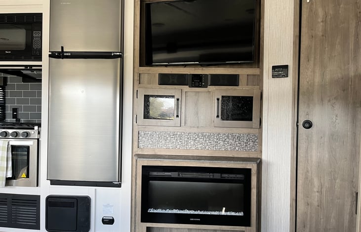 large 40" tv with fireplace for ambience.