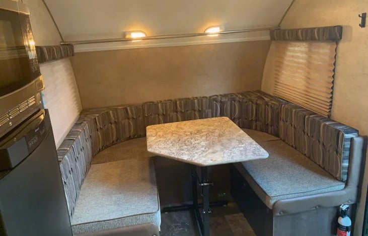 "Suite Pod" has a front U-shaped dinette with lots of room for company!