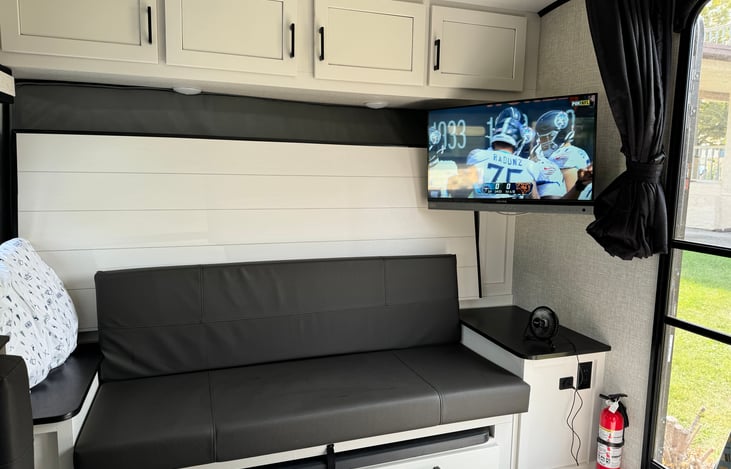 The queen bed turns into a couch for more seating.