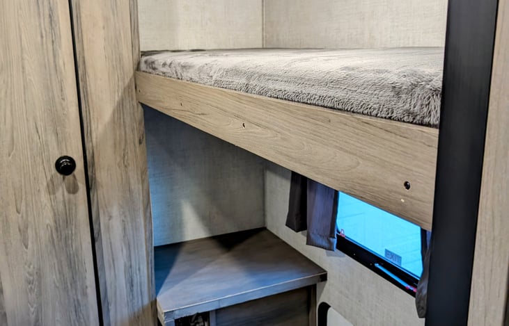 Storage under bunk has outdoor hatch, making it easy for you to grab your stored gear from outside!