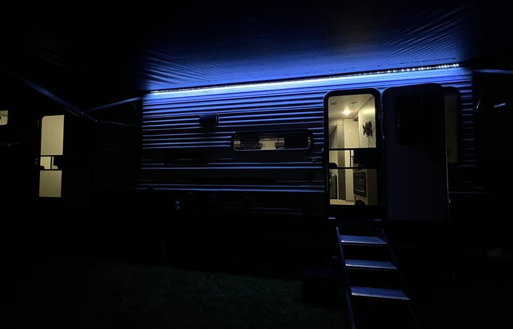 Exterior light and awning for that night ambience.